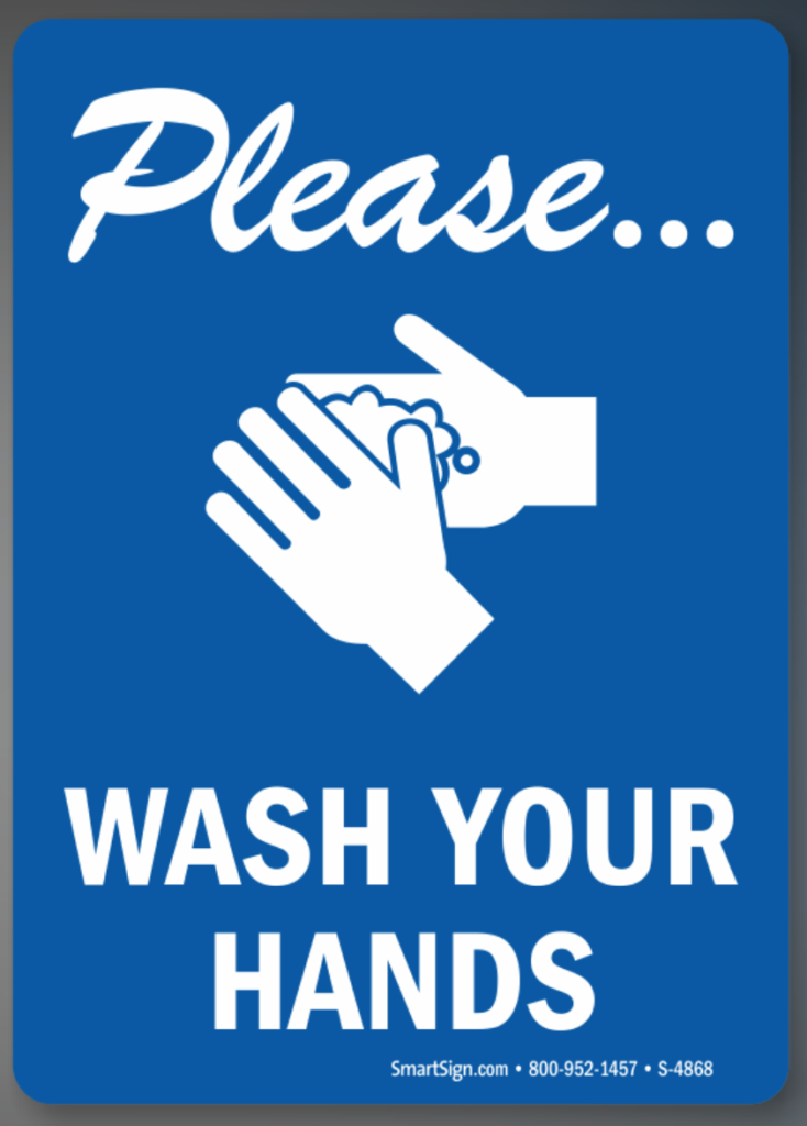 A 'wash your hands' sign.